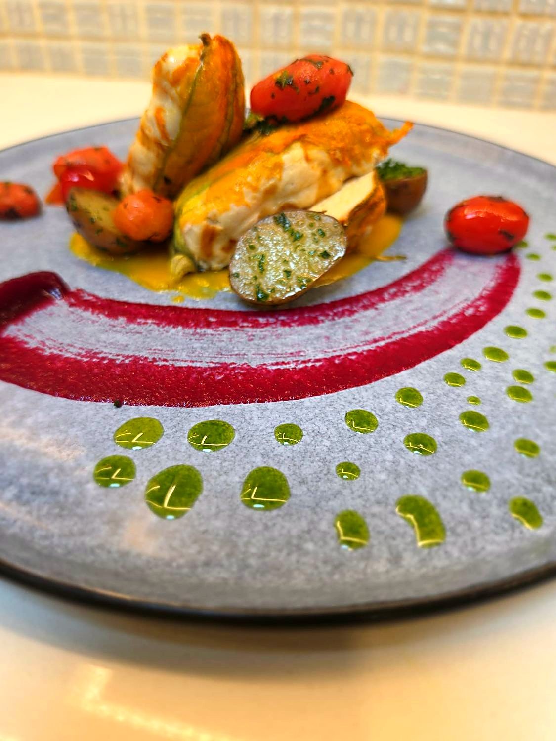 Chicken with courgette flower and beet purée